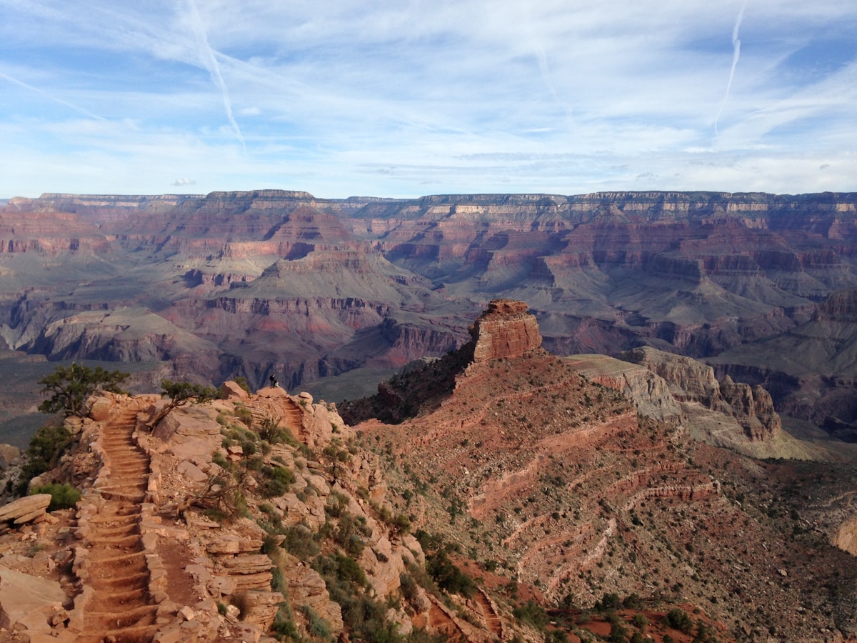 Red sandstone buttes rise above the desert landscape in Sedona, Arizona